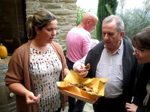 Carla hands out the porcini appetizers. Che buona!